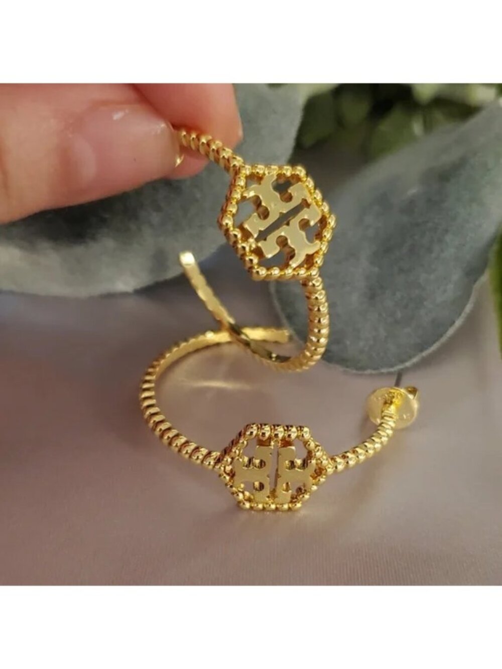 with logo hoop earrings